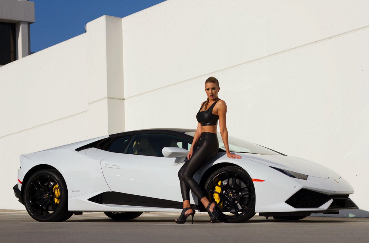 Model Poses With Lamborghini Huracan